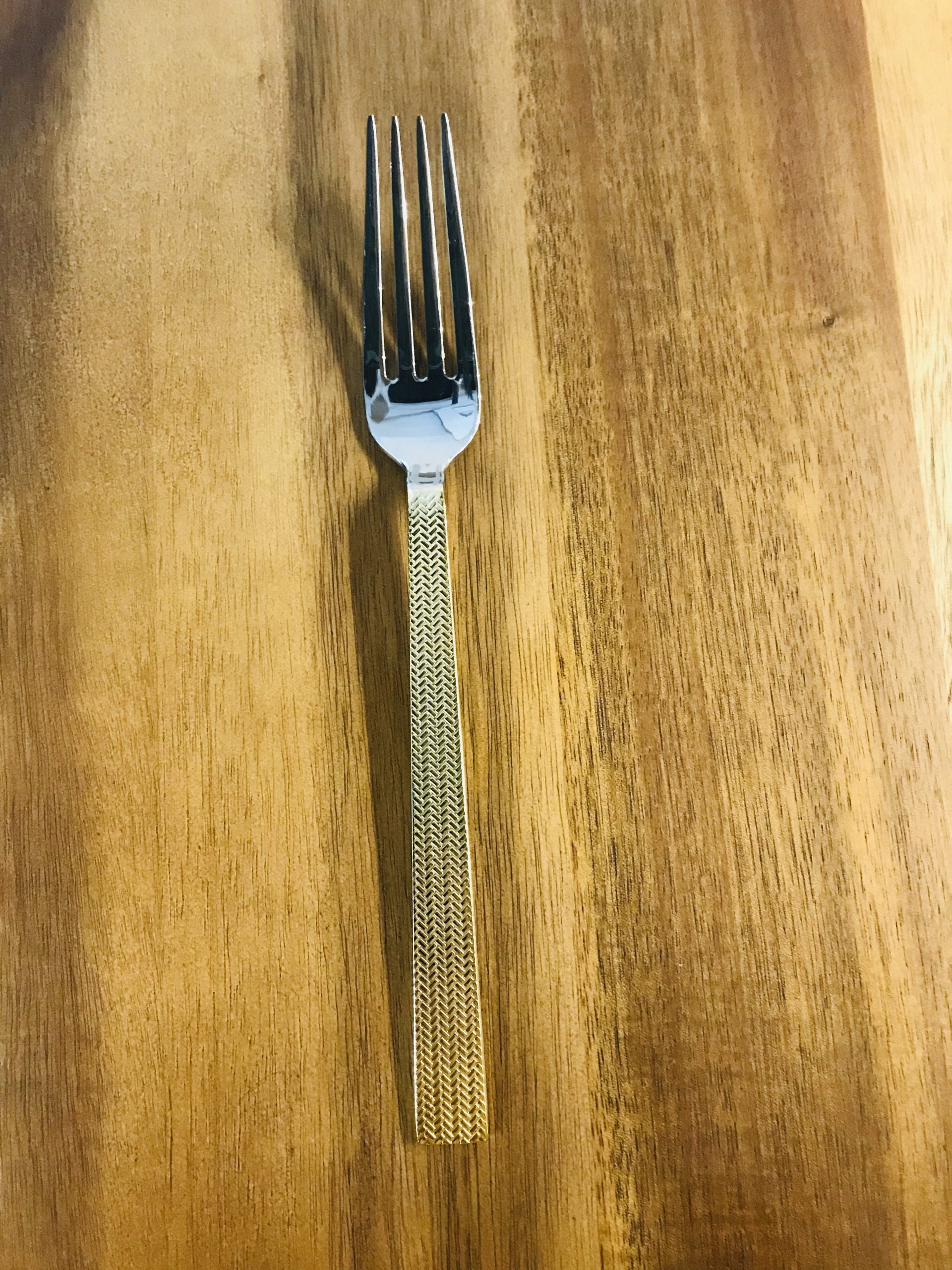 Gold handle dinner fork