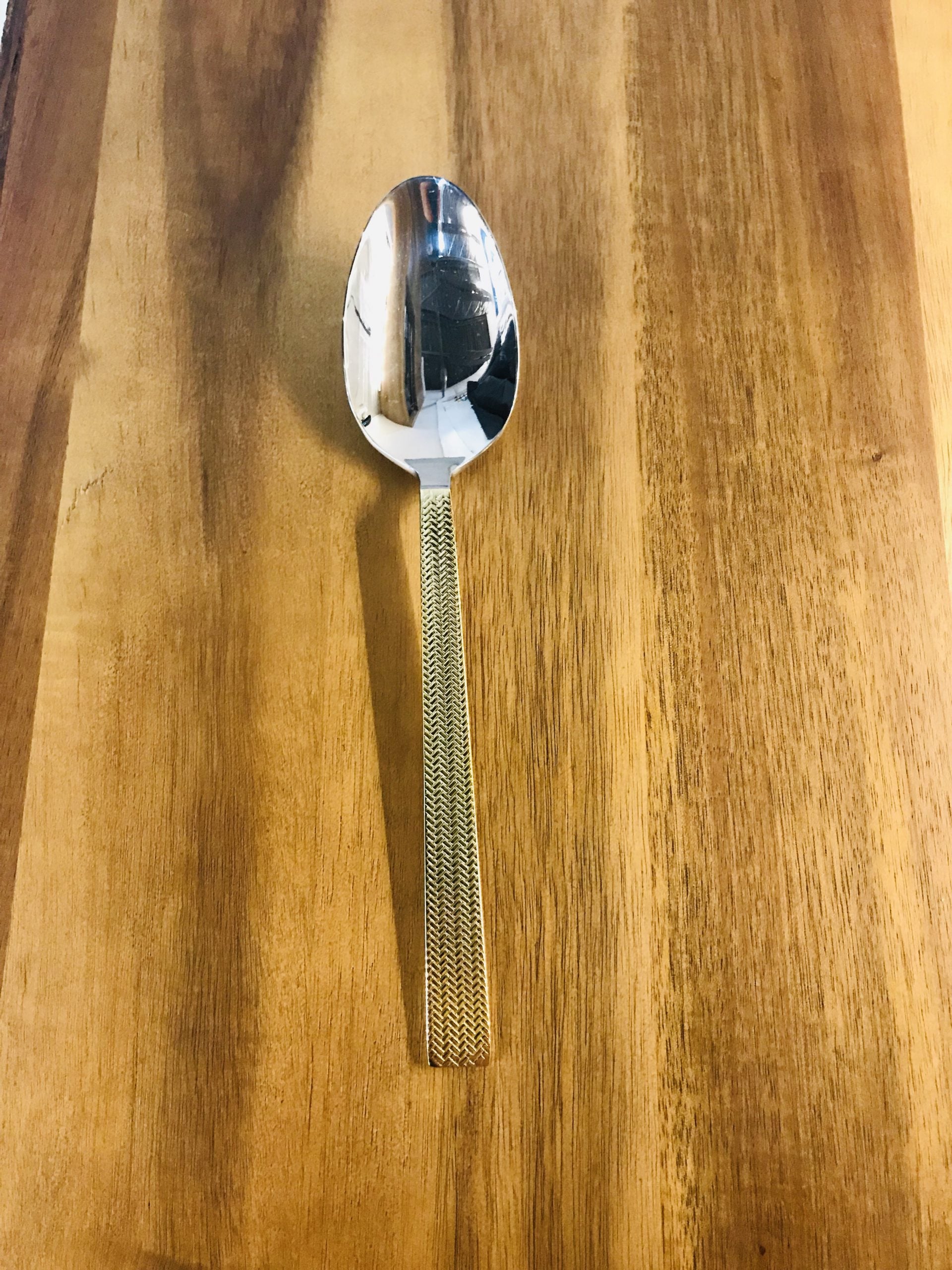 Gold handle soup spoon