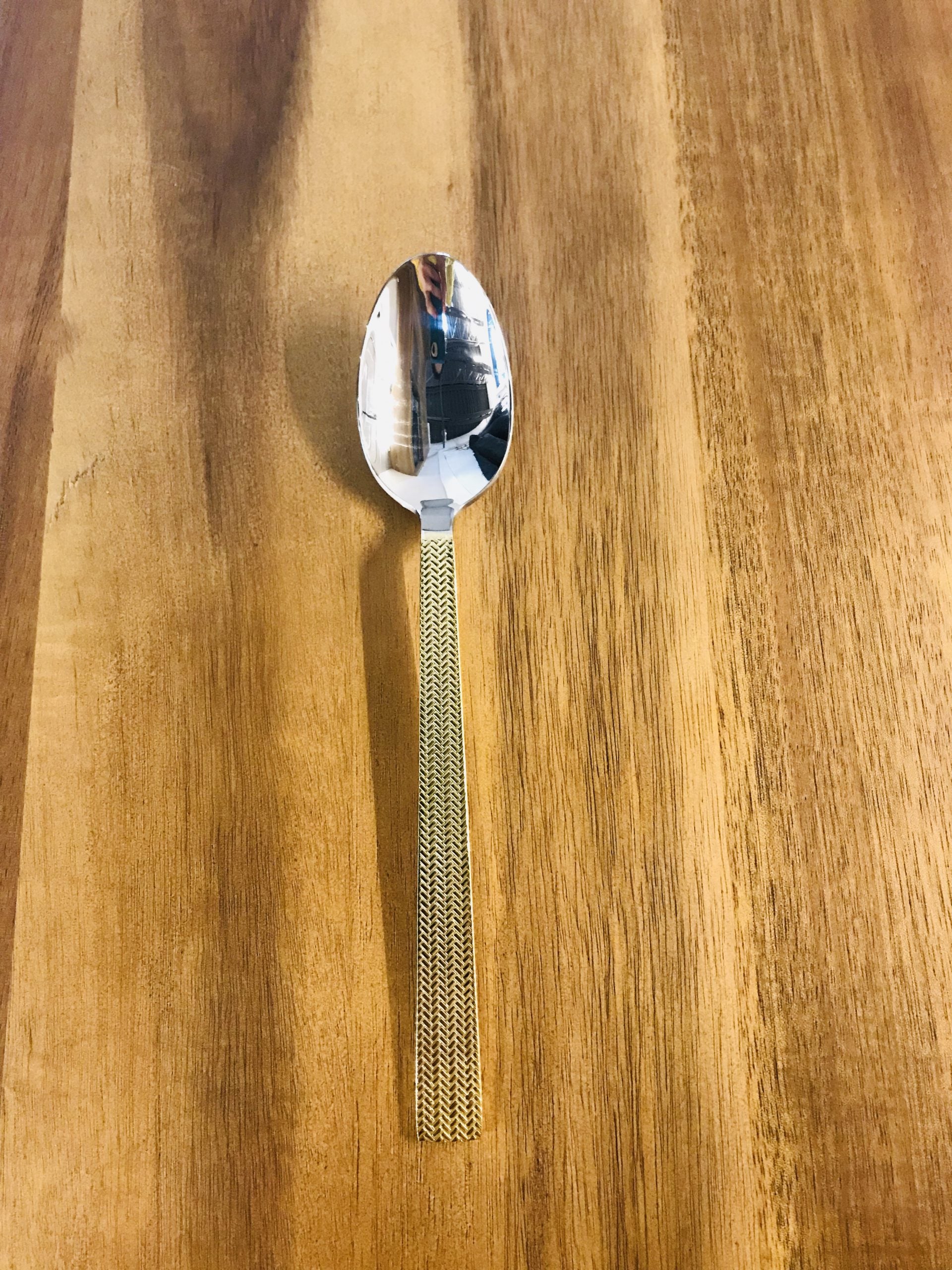 Gold handle teaspoon